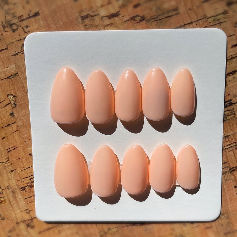 Beautiful pink custom press on nails with dainty white lines